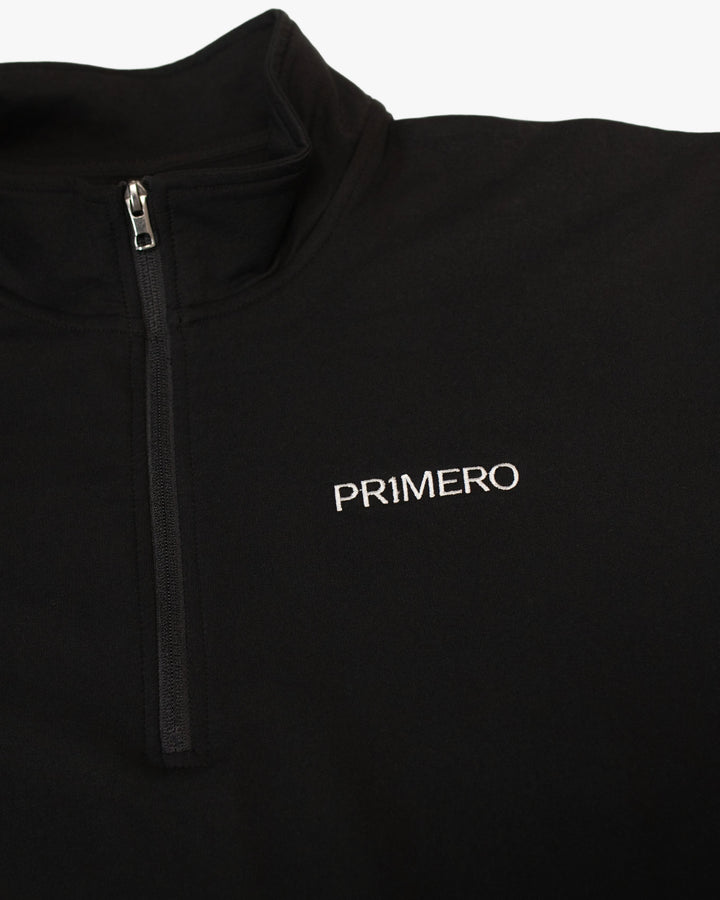 Black quarter-zip pullover with 'PRIMERO' logo on a white background